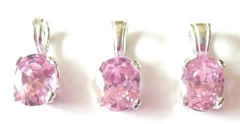 pinklabsapphire10x8mmovalpendants[1]
